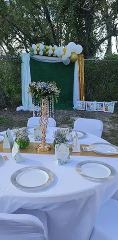 Green white and gold baby shower table